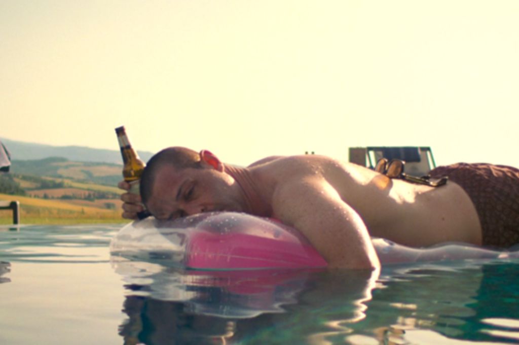 Man lying on his front in a pool_nonprofit humour