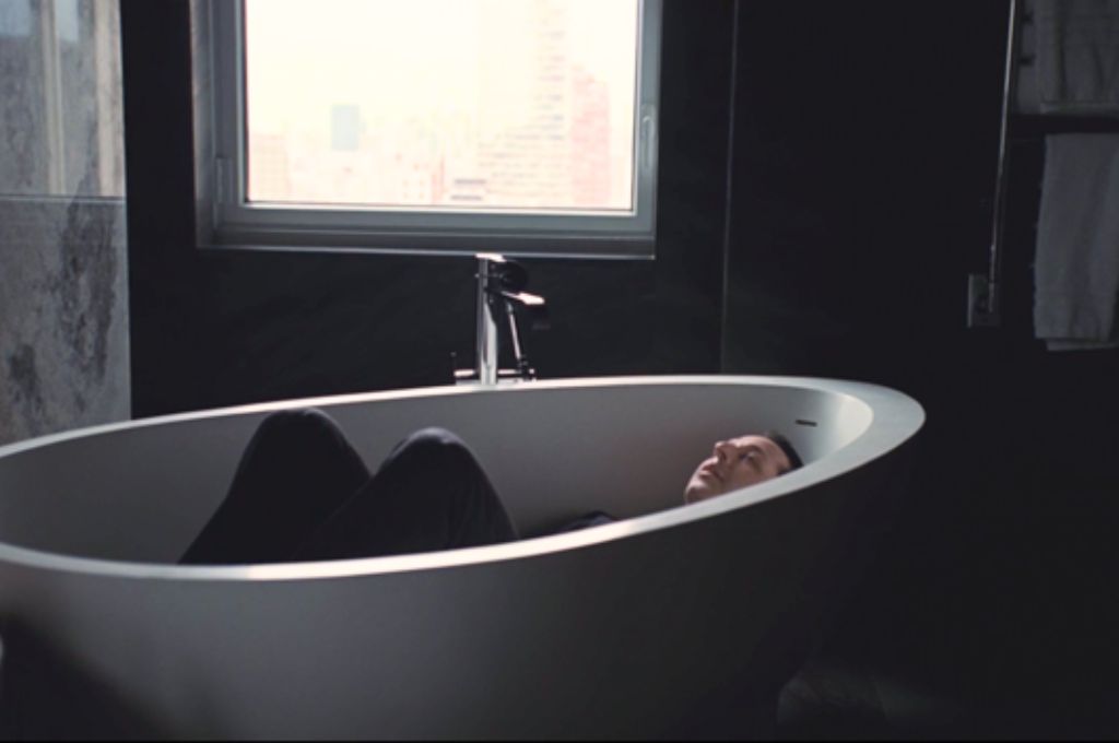 A man lying in his bathtub_nonprofit humour