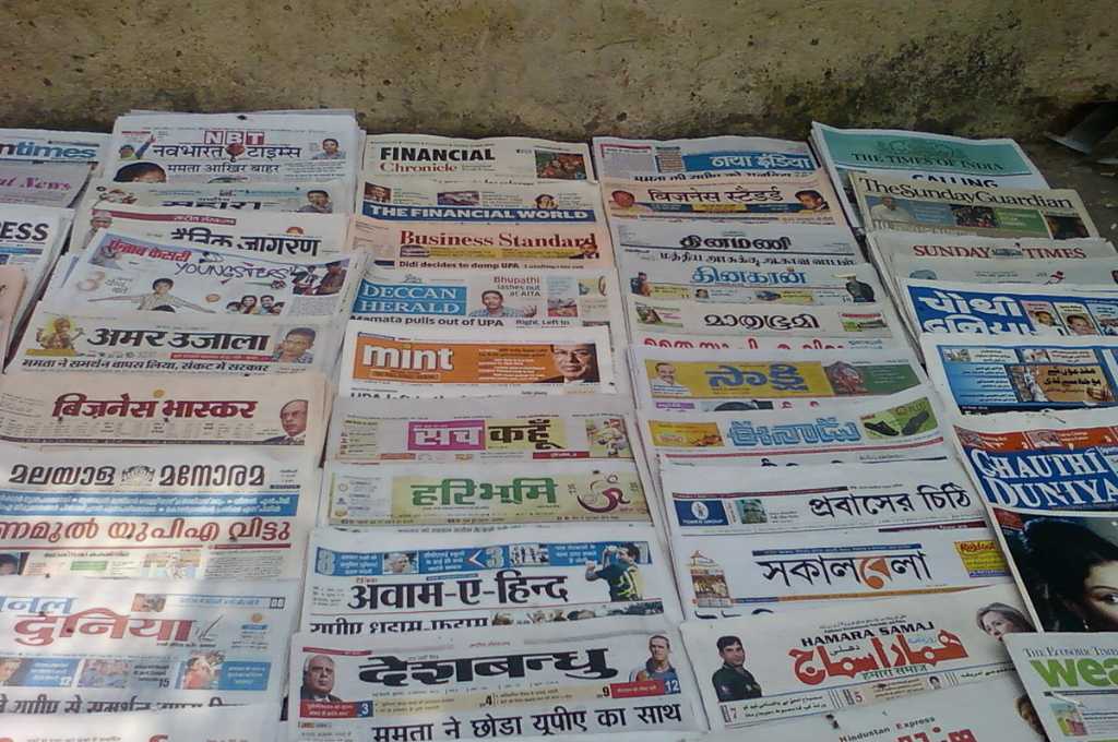 Indian newspapers laid down on a table_climate change news