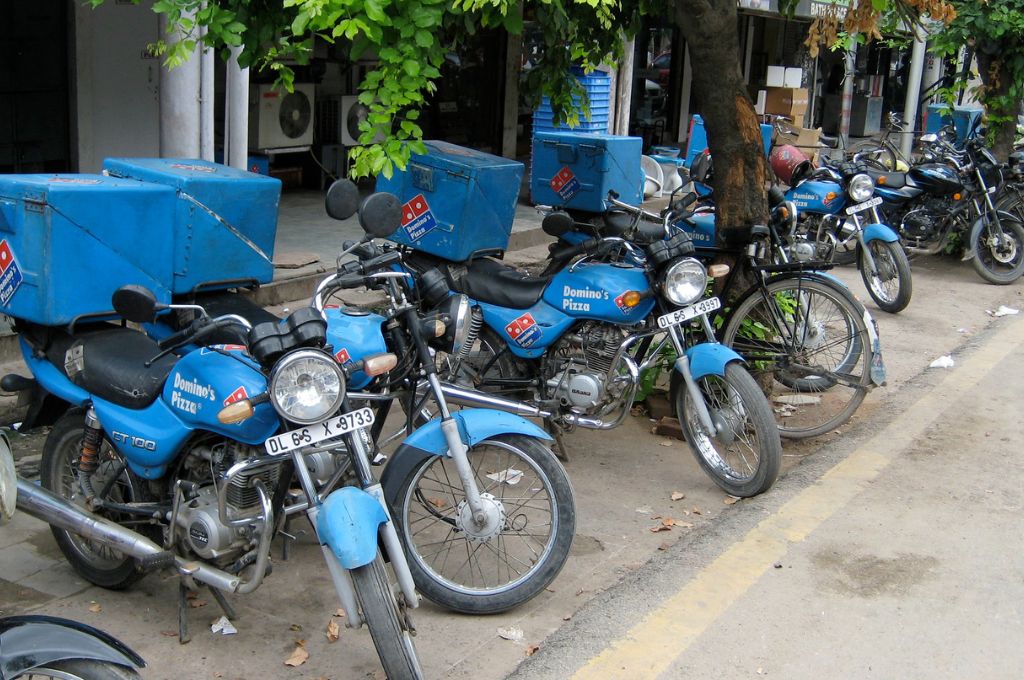 blue delivery bikes parked-gig-workers