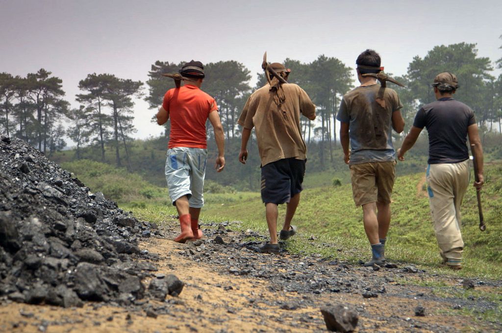 four miners at a coal mine_just transition