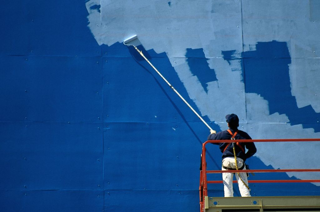 A man painting a wall_nonprofit humour