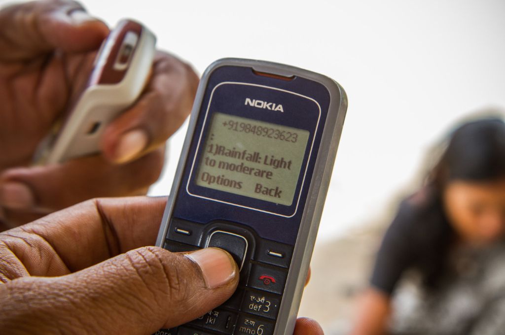 A nokia mobile phone saying rainfall: light to moderate_tech and climate change