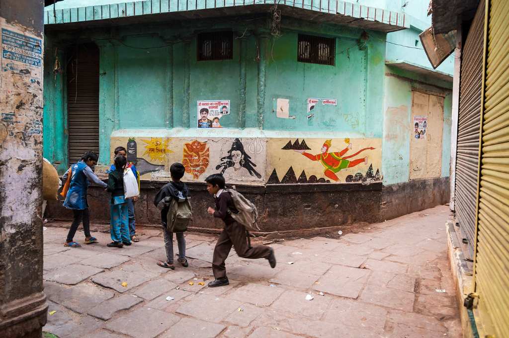 a group of schoolchildren on a street--NEP 2020