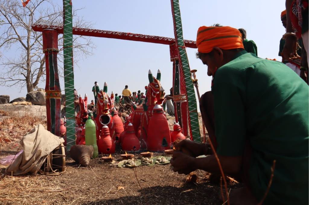 A person from the Rathwa tribe worshipping-adivasi community