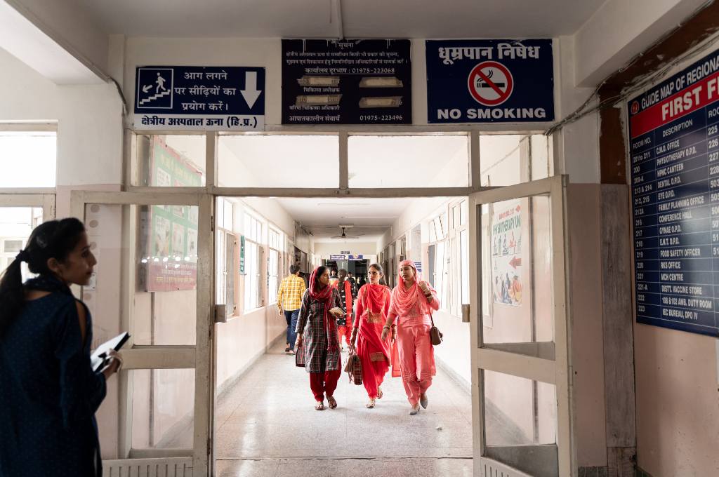 a group of women walking down a hospital corridor--interactive service design