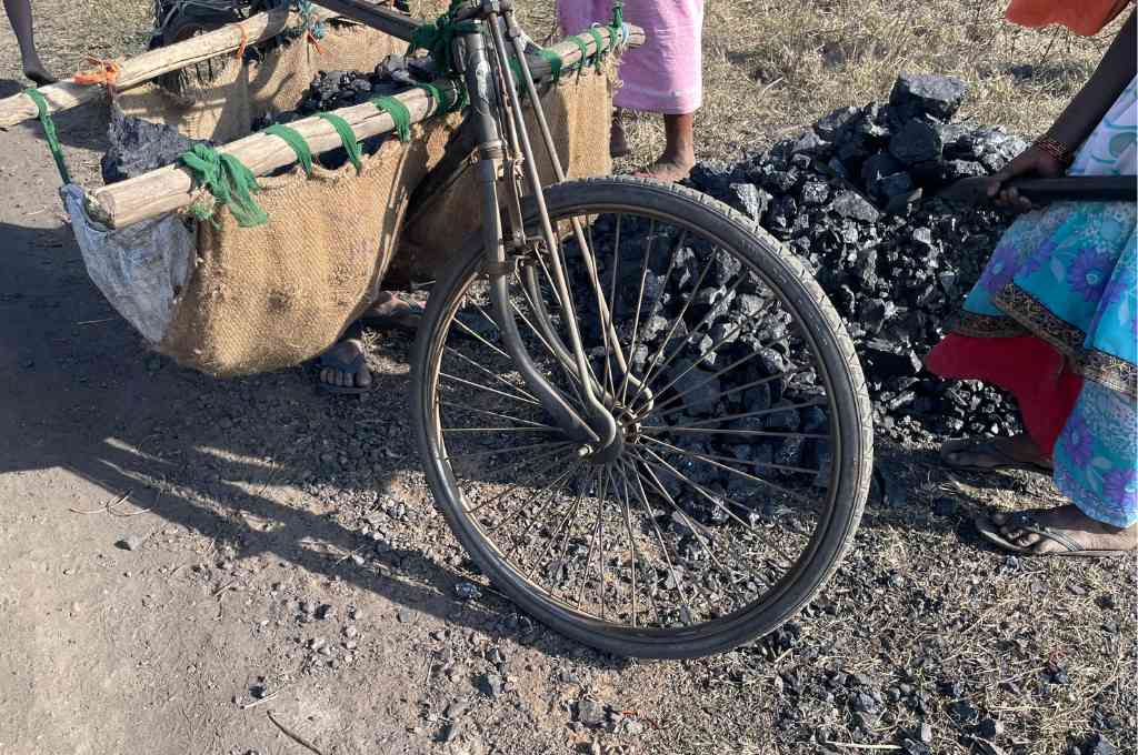 A bicycle carrying coal_coal