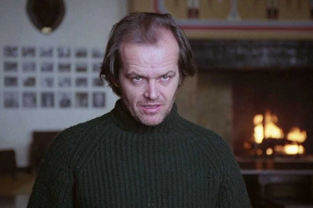 Jack Nicholson from the Shining in a black sweater_nonprofit humour