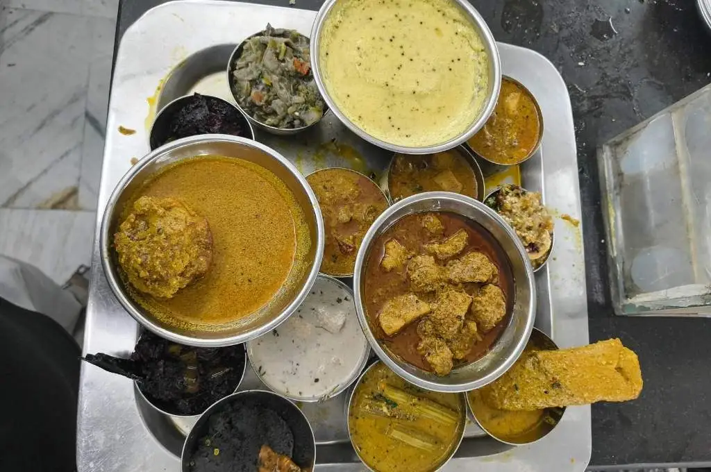 a tray with small bowls of food-food waste