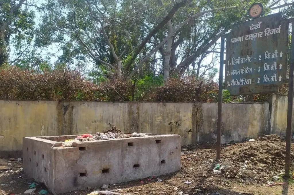 Rural waste collection site with scattered litter_waste management
