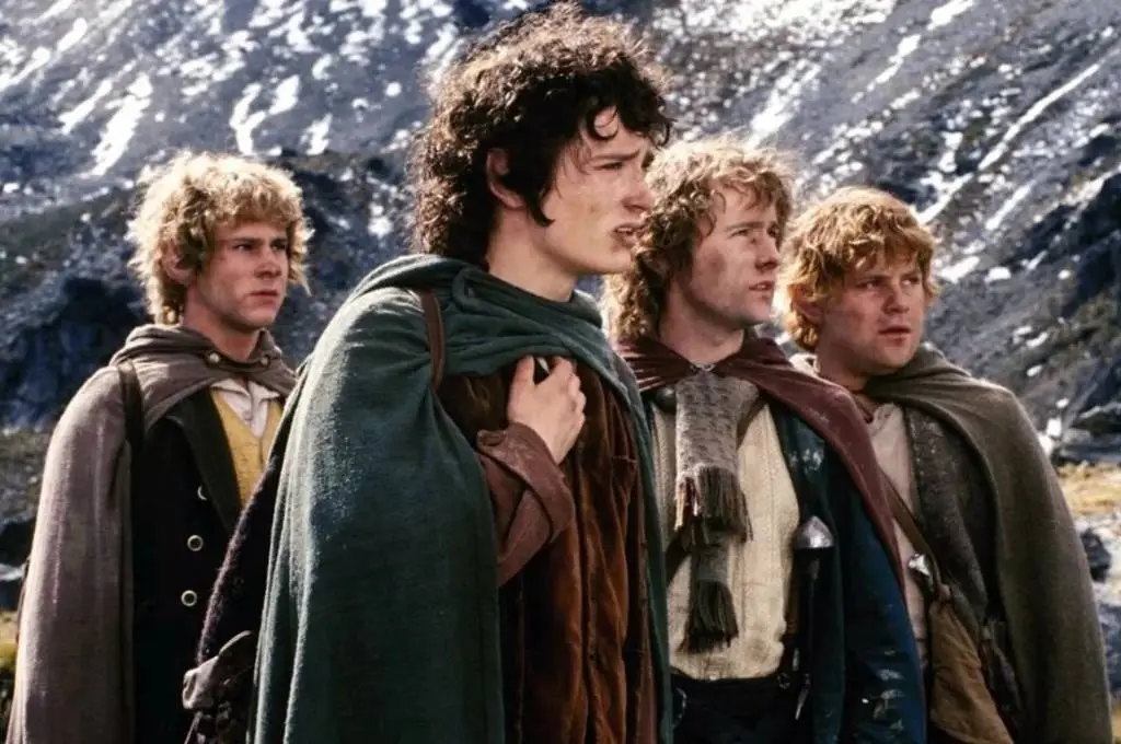 the hobbits frodo baggins, samwise gamgee, peregrin took, and meriadoc brandybuck as part of the fellowship of the ring in the misty mountains--nonprofit humour