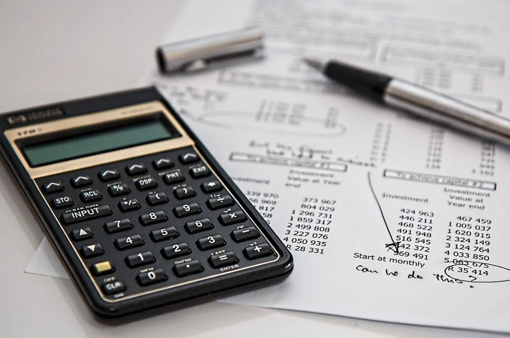 A calculator and papers_FCRA