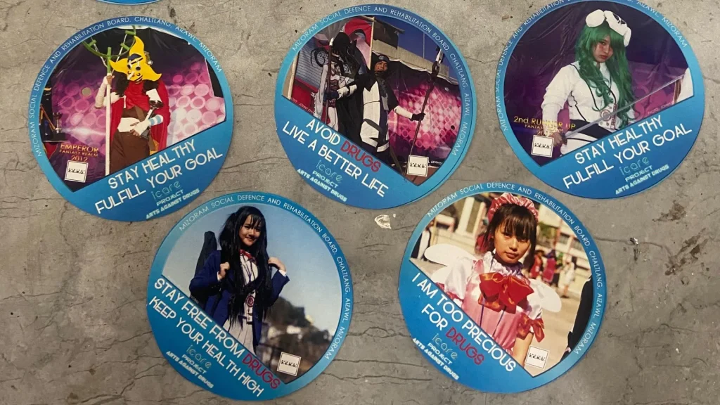 badges with photos of cosplayers and messages against drug abuse as part of the iCare campaign--cosplay in Mizoram