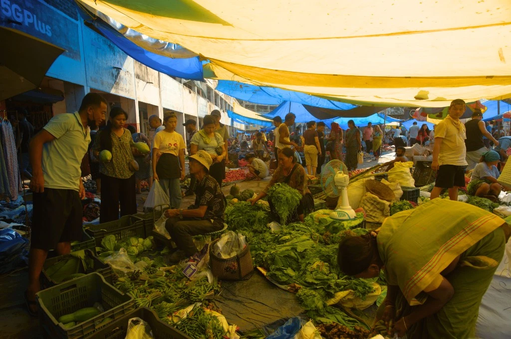 a crowded vegetable market in dimapur, nagaland--climate adaptation