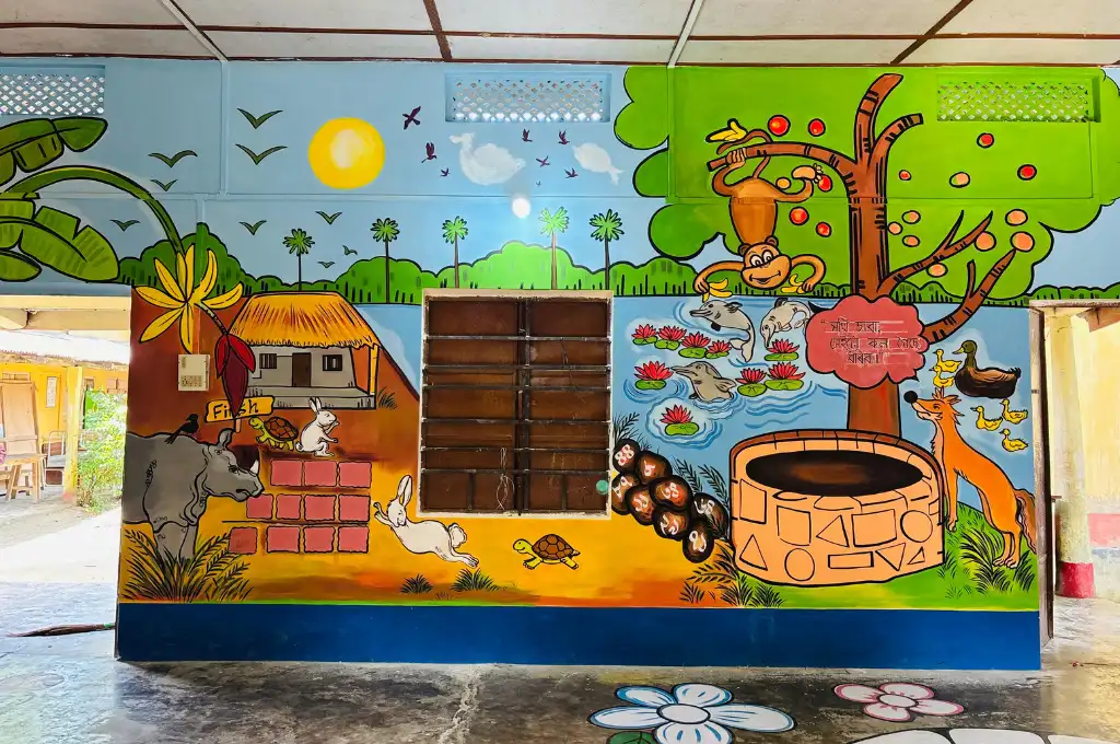 A wall with illustrations of rhinos and monkeys at a school--social-emotional learning