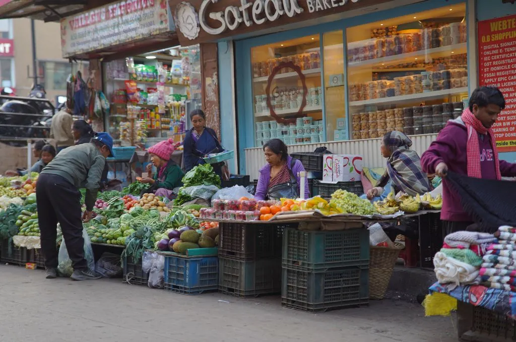vegetable vendors selling vegetables and fruits on the street--street vendors