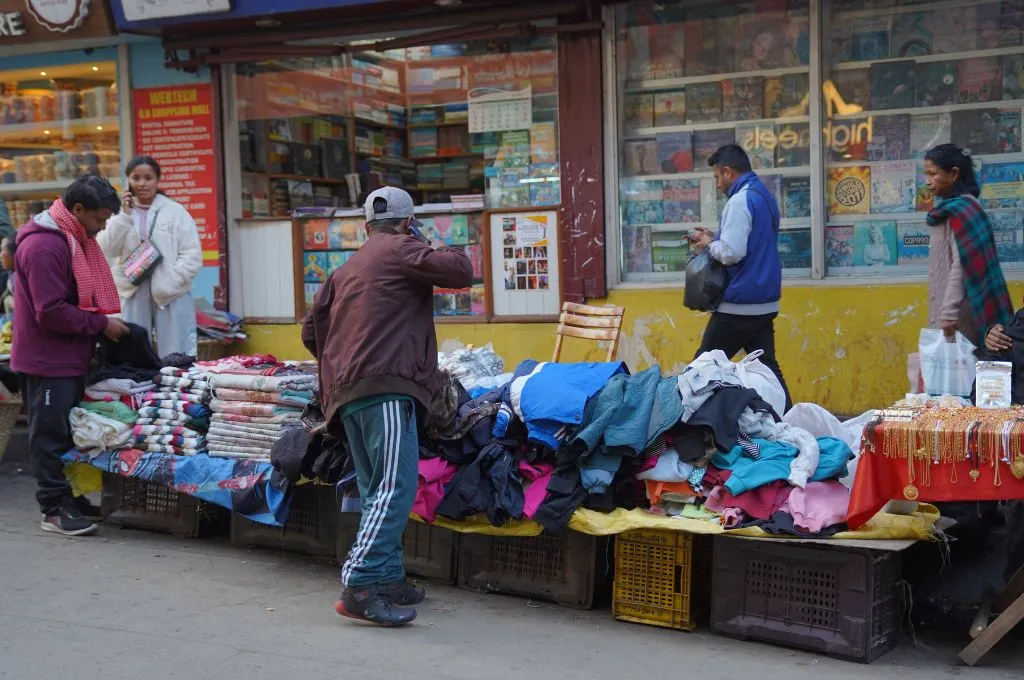 roadside stalls selling winter clothes and trinkets--street vendors