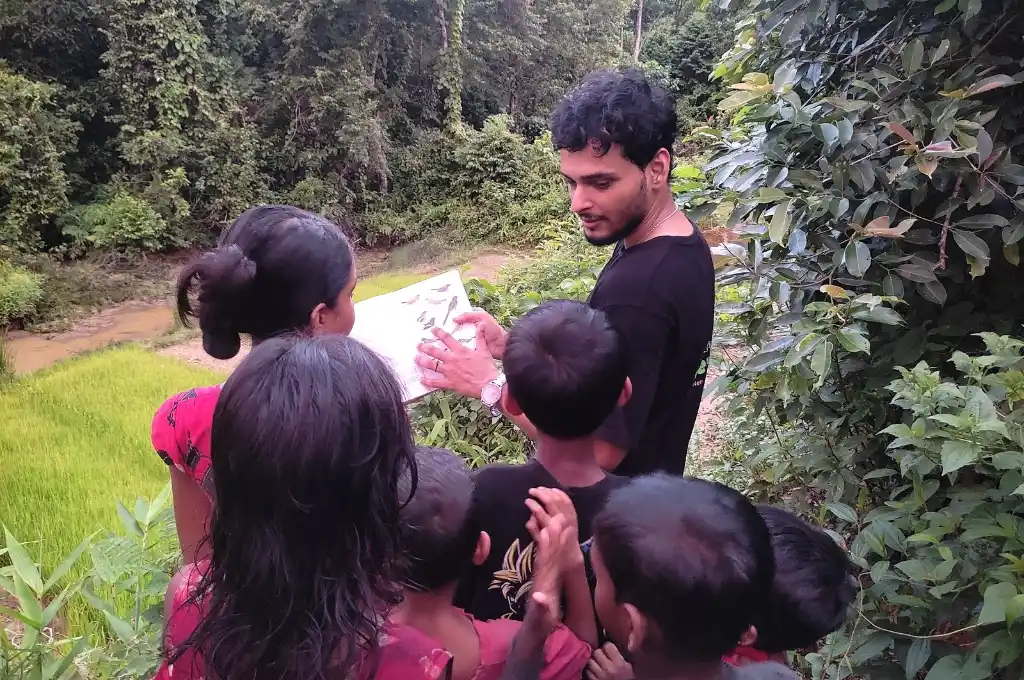 Children engaged in audiovisual identification of birds in Panicherra village--citizen science