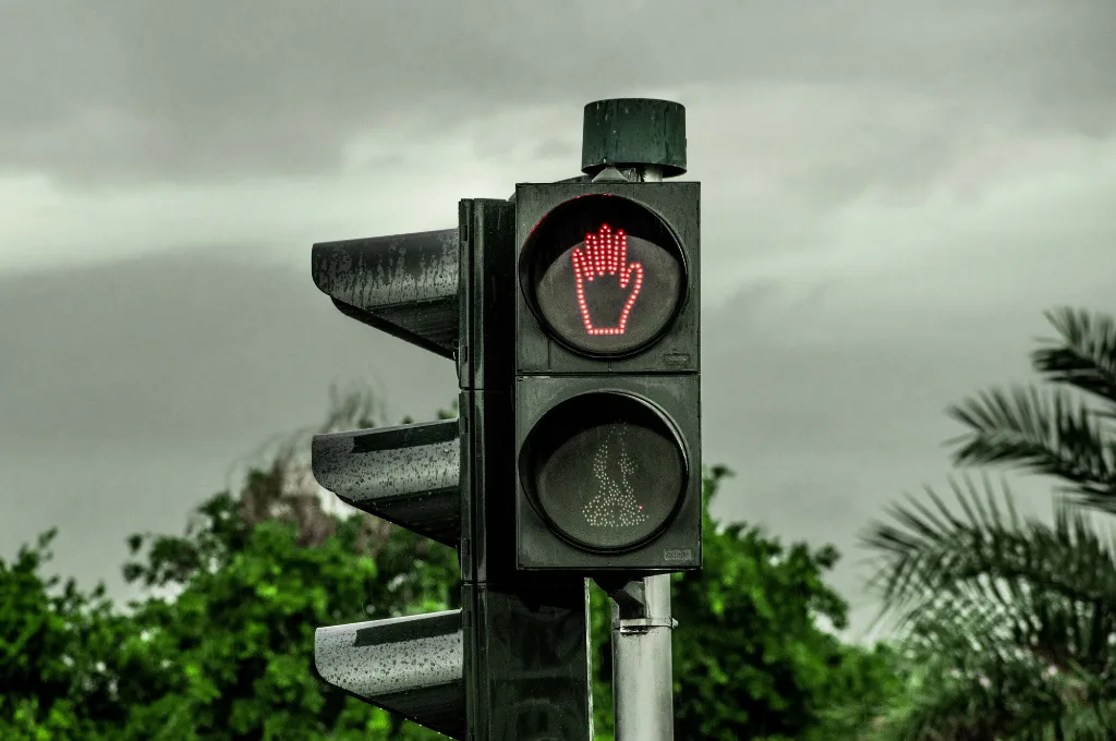 a traffic signal with the stop sign for pedestrians on--FCRA