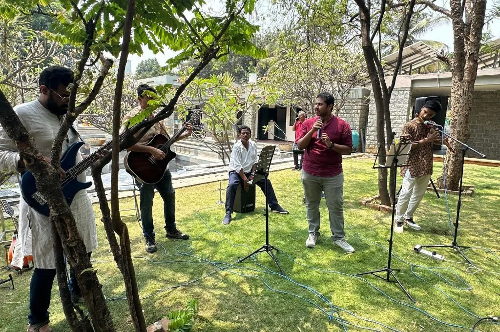a band of musicians performing in an open space--hospice facilities