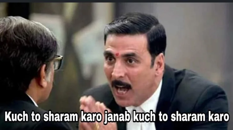 a still from a film starring Akshay Kumar with the actor standing with his hands folded and seemingly saying, "Kuch to sharam karo janab, kuch to sharam karo"--nonprofit humour