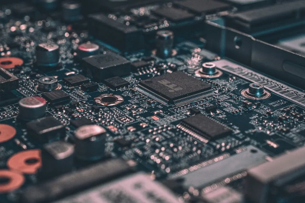 Close-up of a computer circuit board with electronic components and microchips--AI in governance