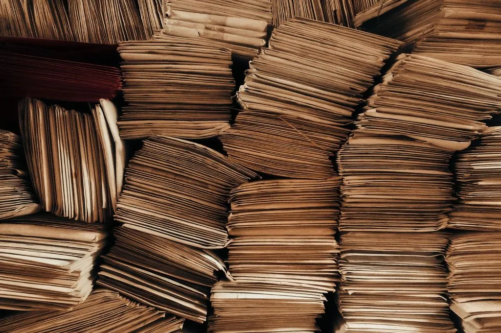 stacks of papers browned with age--Monitoring evaluation and learning